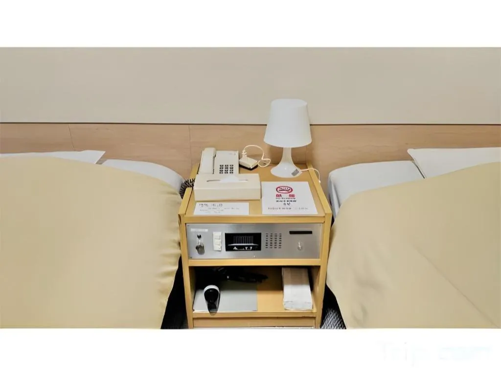 Bed in Ikebukuro Royal Hotel