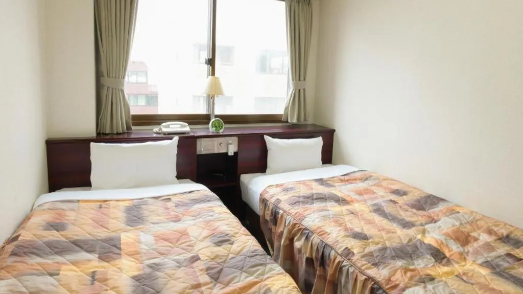 Bed in Business Hotel Shuttle