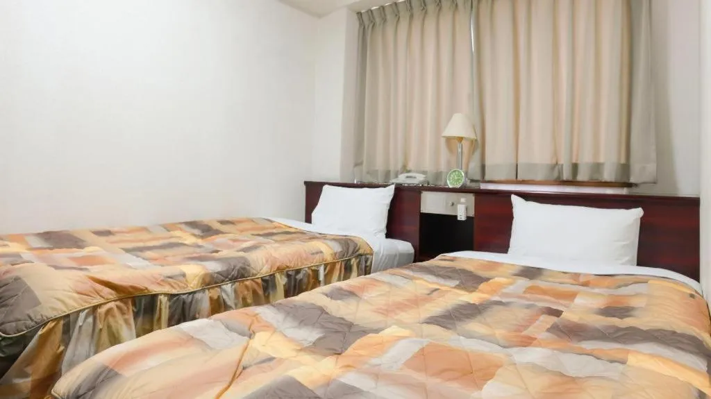 Bed in Business Hotel Shuttle