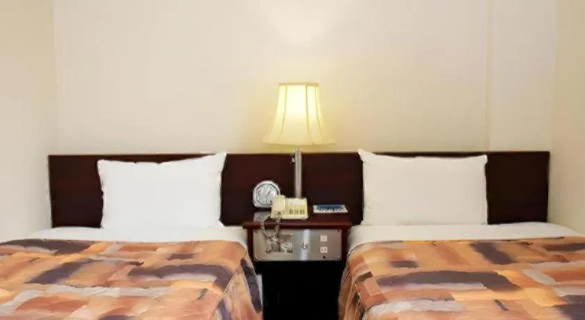 Bed in Business Hotel Shuttle