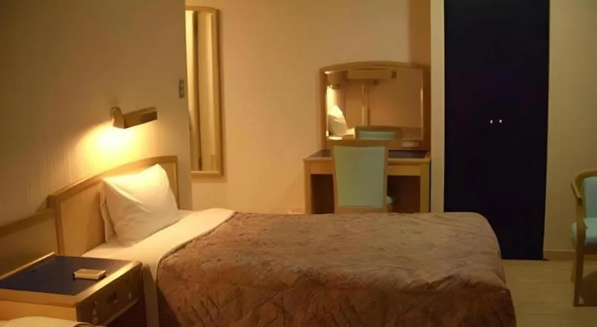 Bed in Matsuyama City Hotel