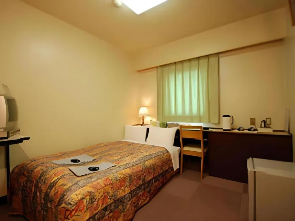 Bed in Hakata Marine Hotel