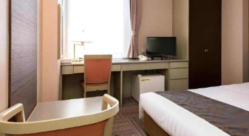 Bed in New Biwako Hotel