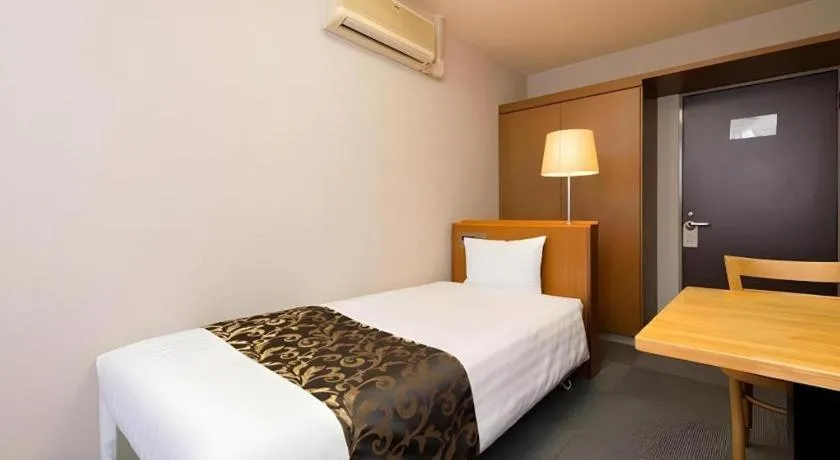 Bed in New Biwako Hotel