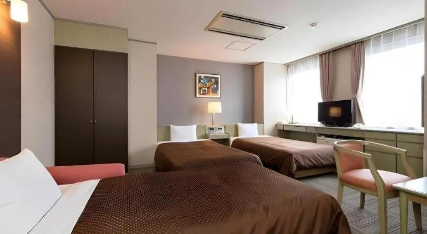 Bed in New Biwako Hotel