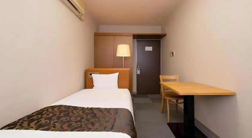 Bed in New Biwako Hotel