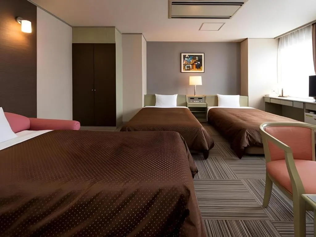 Bed in New Biwako Hotel