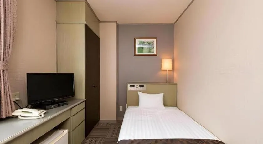 Bed in New Biwako Hotel