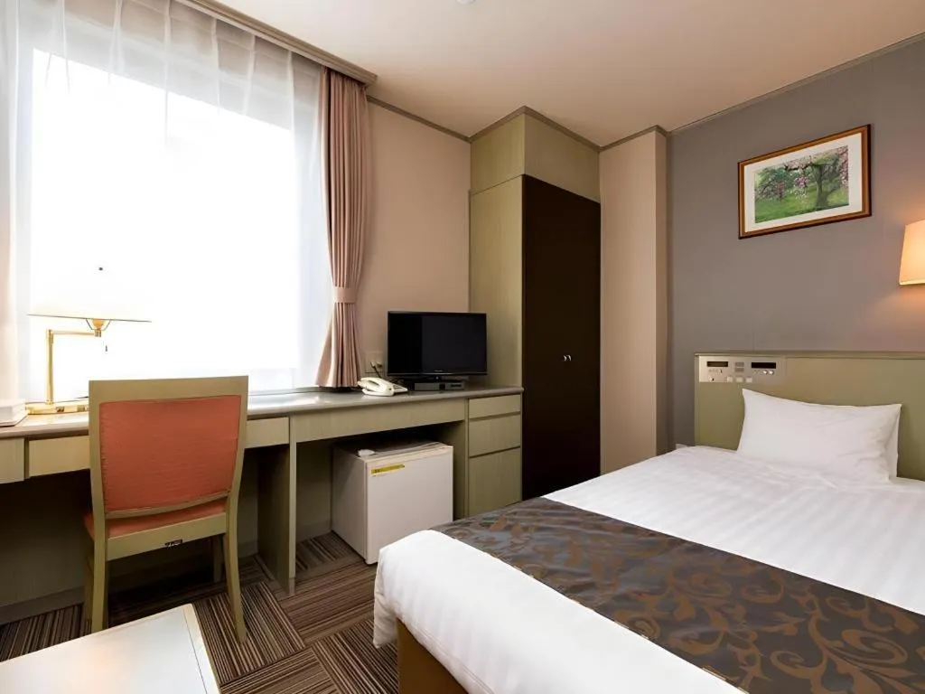 Bed in New Biwako Hotel