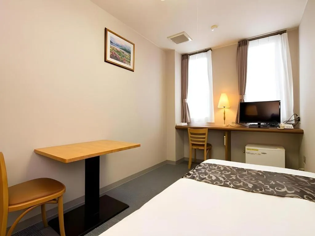 Bed in New Biwako Hotel