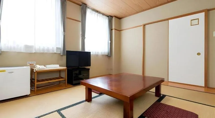 Bed in New Biwako Hotel