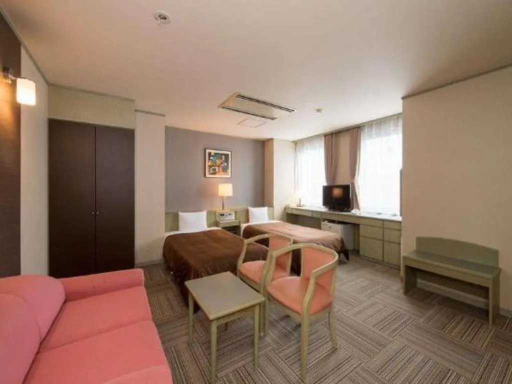 Bed in New Biwako Hotel