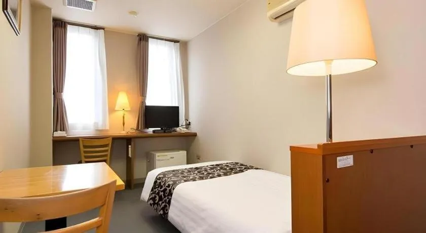 Bed in New Biwako Hotel