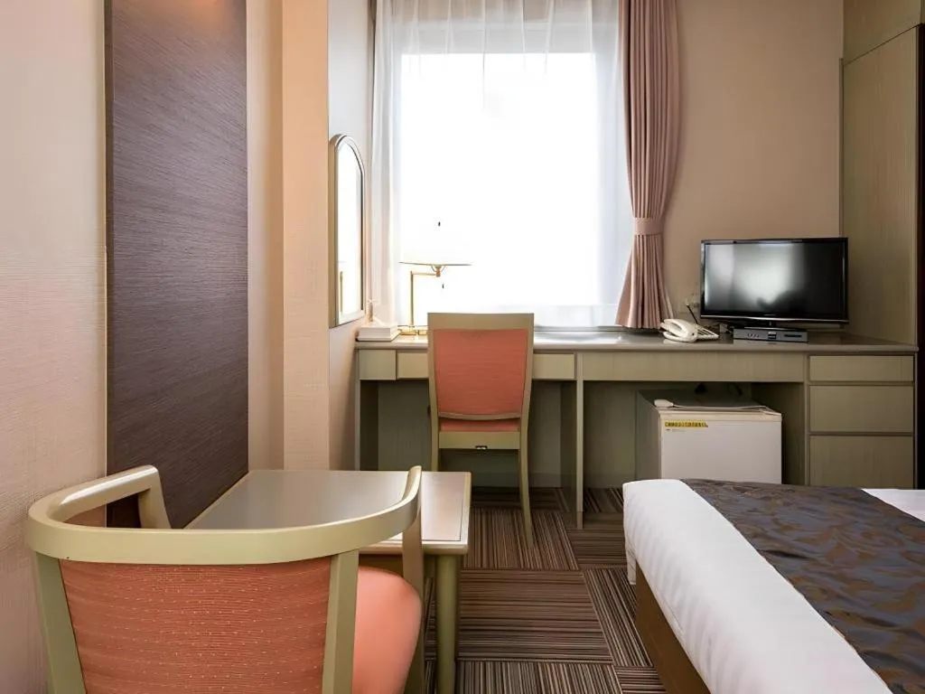 Bed in New Biwako Hotel