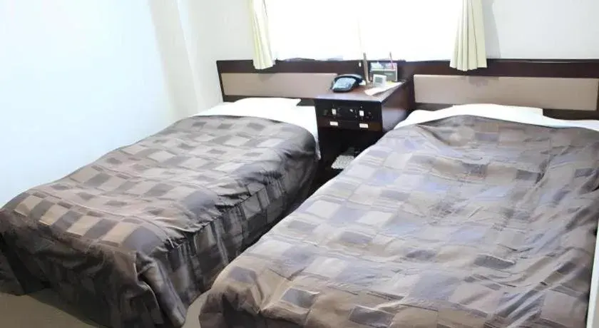 Bed in Hotel Kikuya Bed in Hotel Kikuya