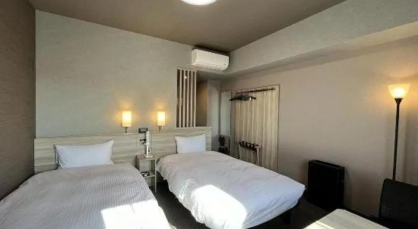 Bed in Hotel Route Inn Miyakonojo