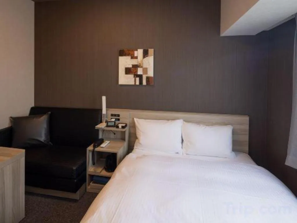 Bed in Hotel Route Inn Miyakonojo