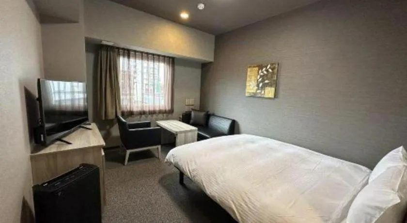 Bed in Hotel Route Inn Miyakonojo