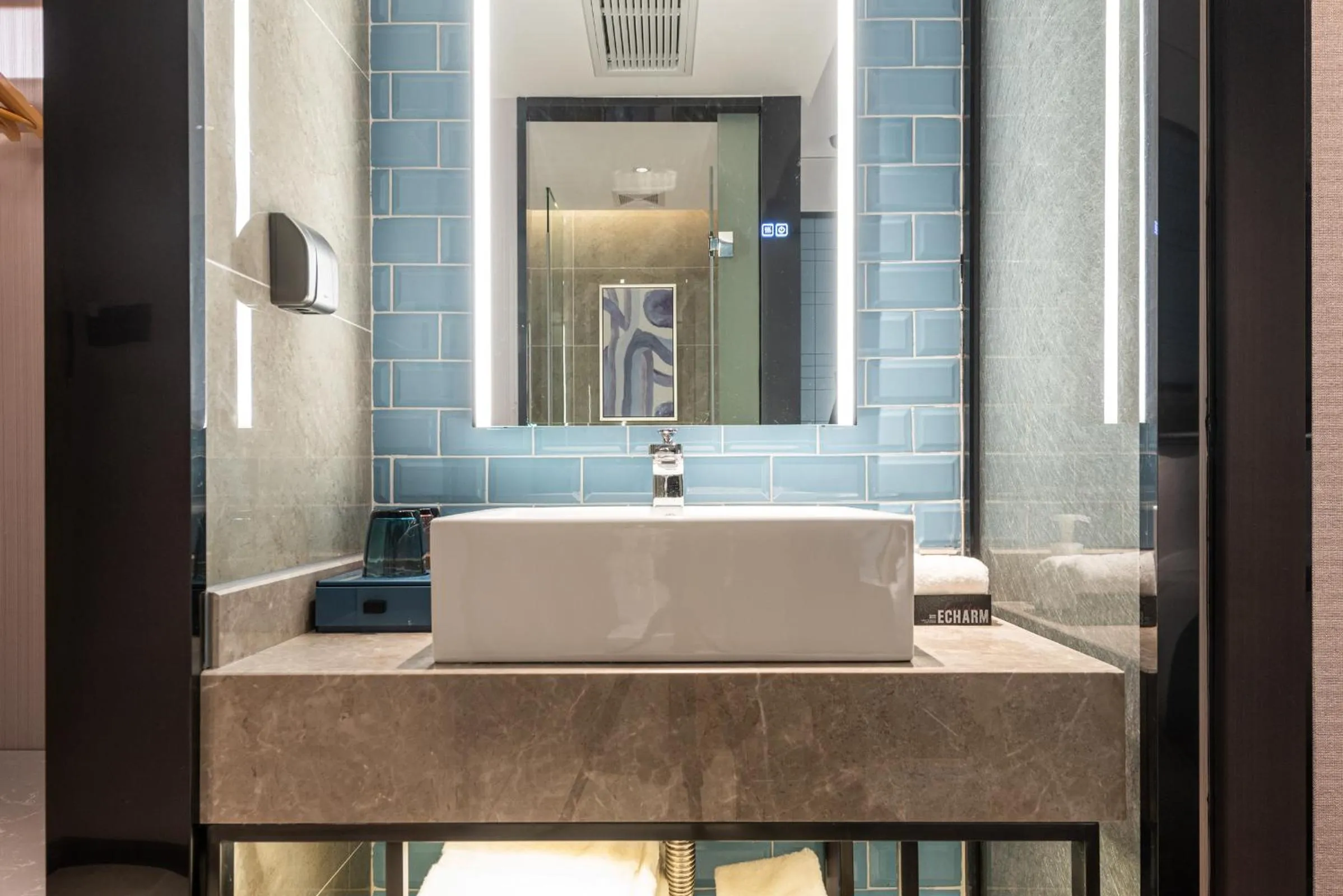 towels in Echarm Hotel Yangshuo West Stree 宜尚酒店 阳朔西街店