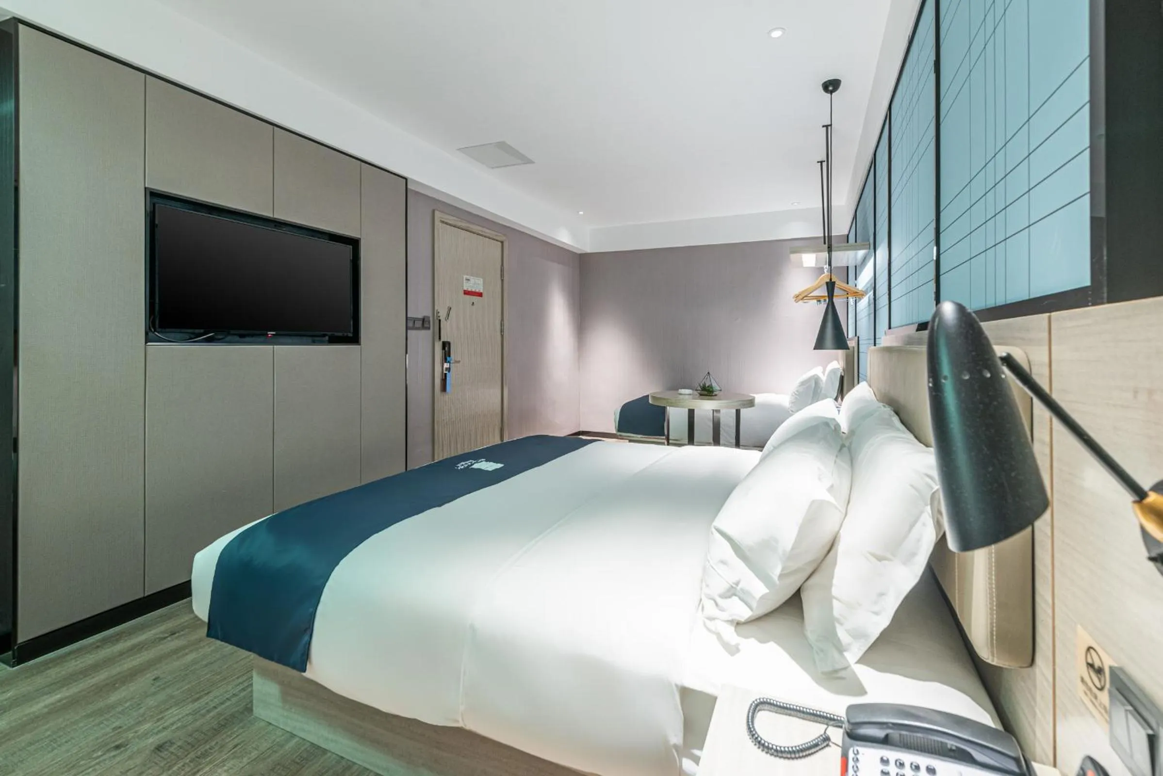 Bedroom, Bed in Echarm Hotel Yangshuo West Stree 宜尚酒店 阳朔西街店