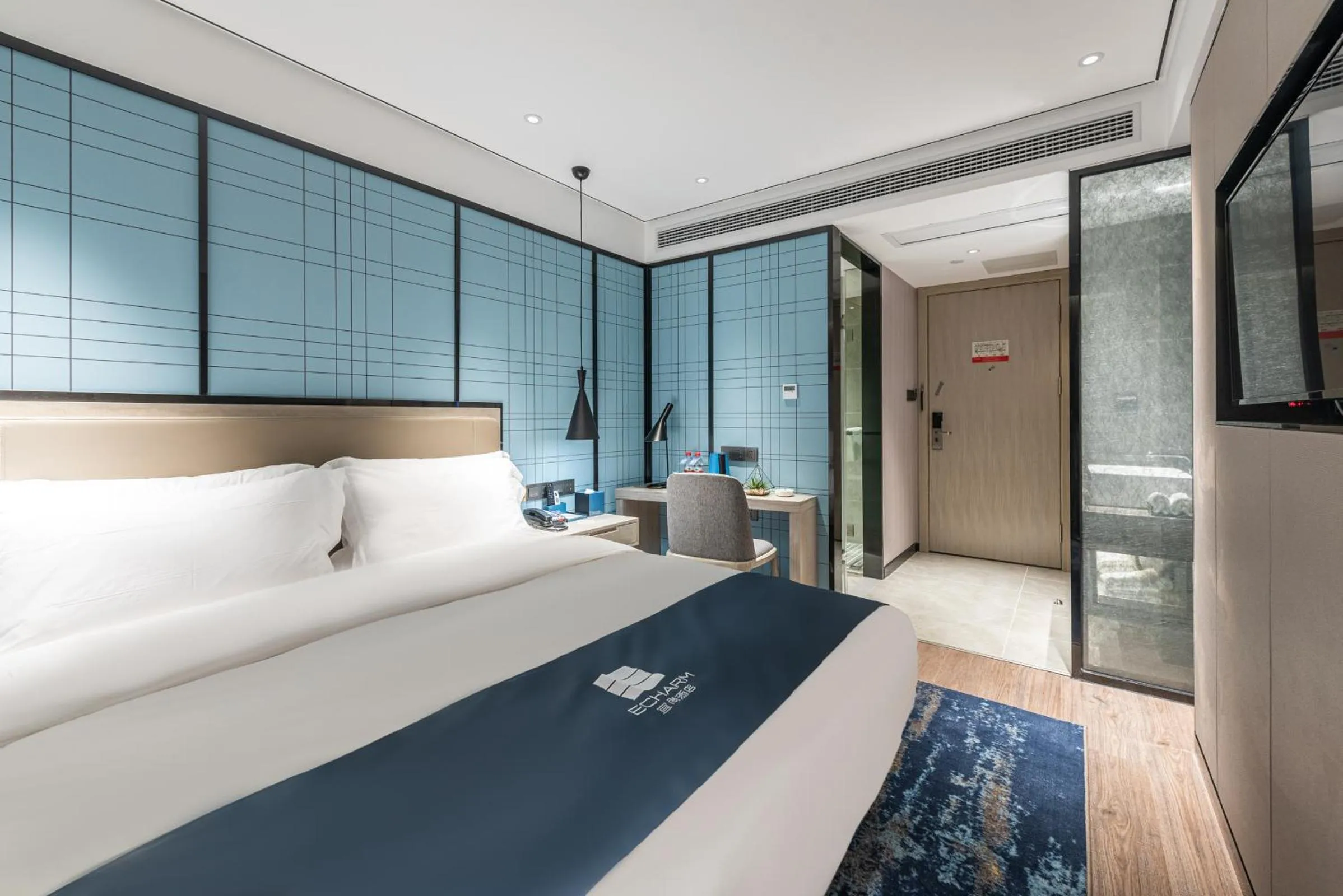 Bed in Echarm Hotel Yangshuo West Stree 宜尚酒店 阳朔西街店