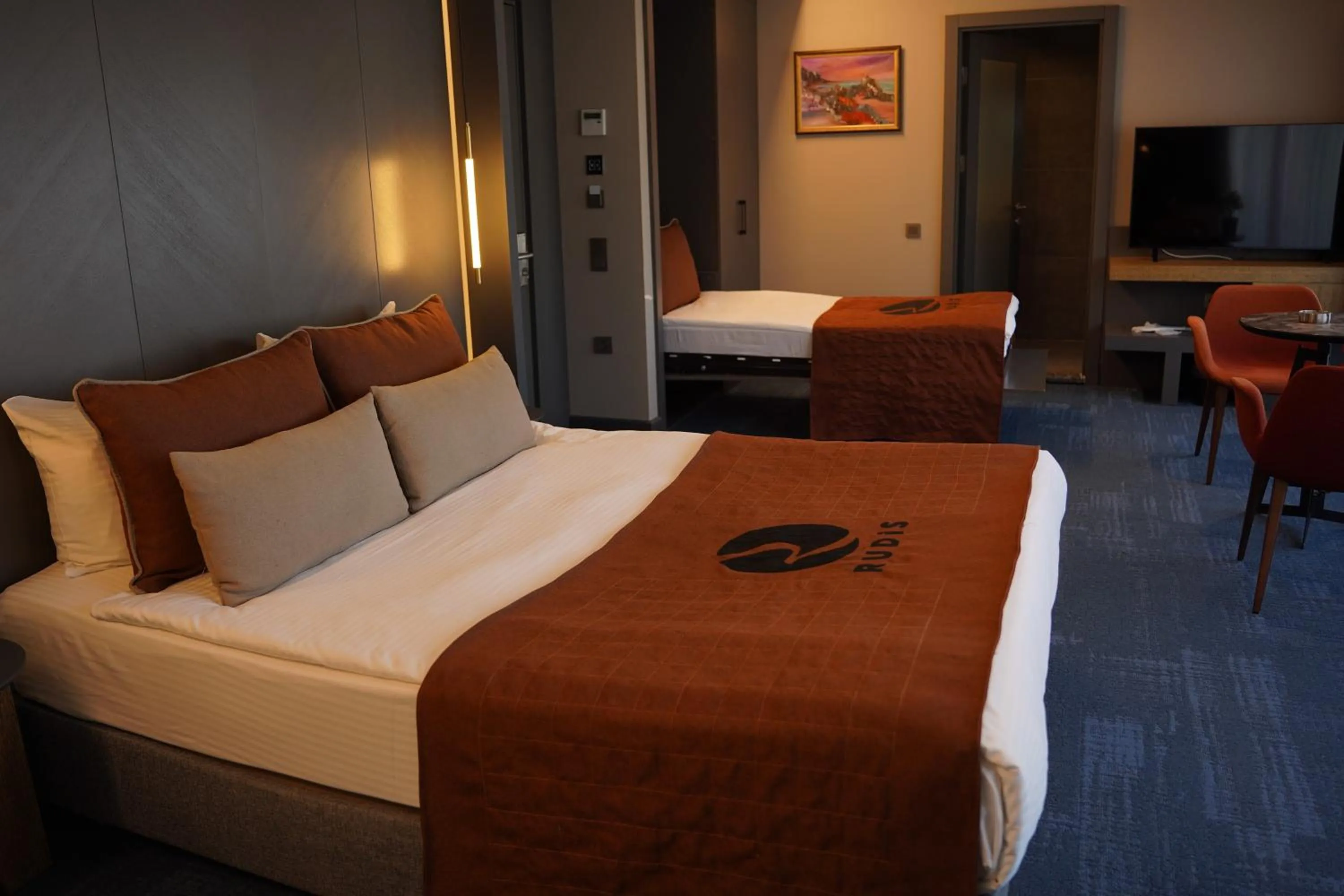 Bed in Rudis Hotel