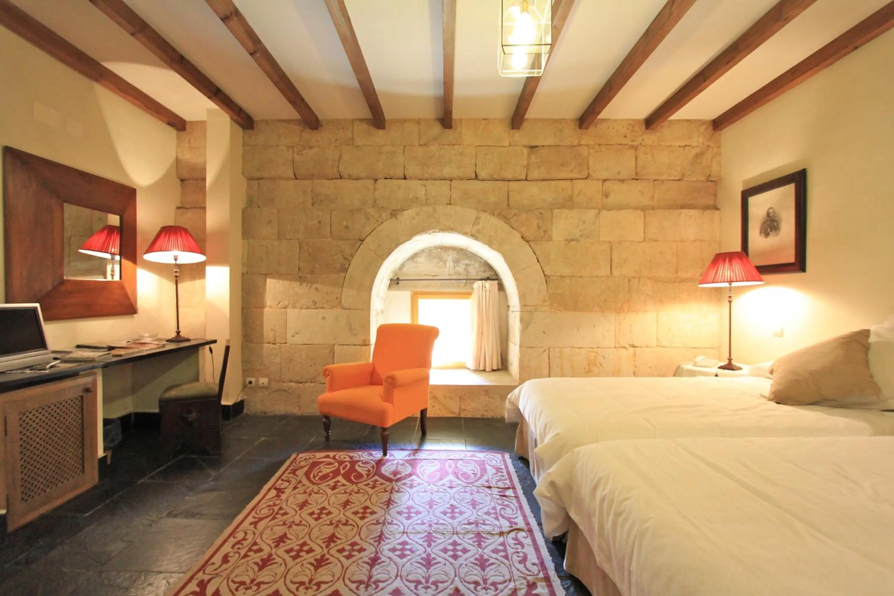 Bed in Posada Real Castillo del Buen Amor