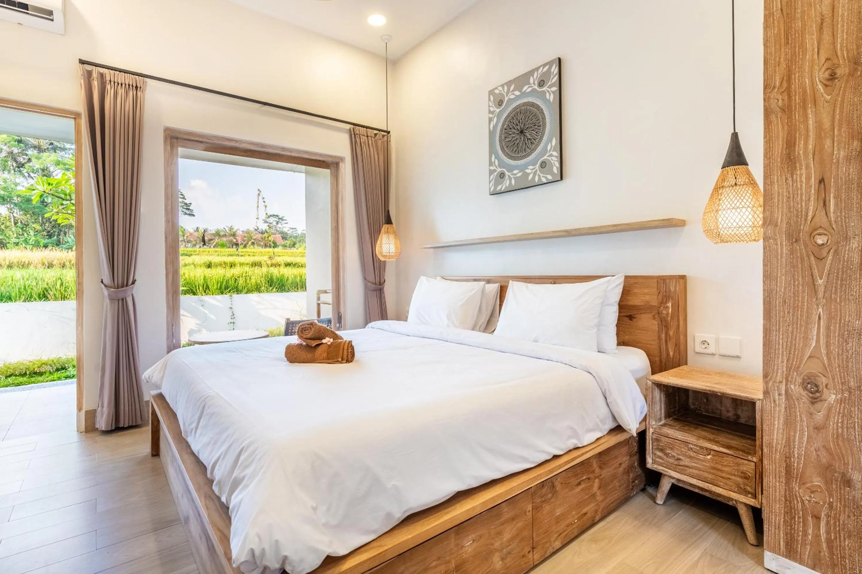 Bed in Aura Apartments Ubud