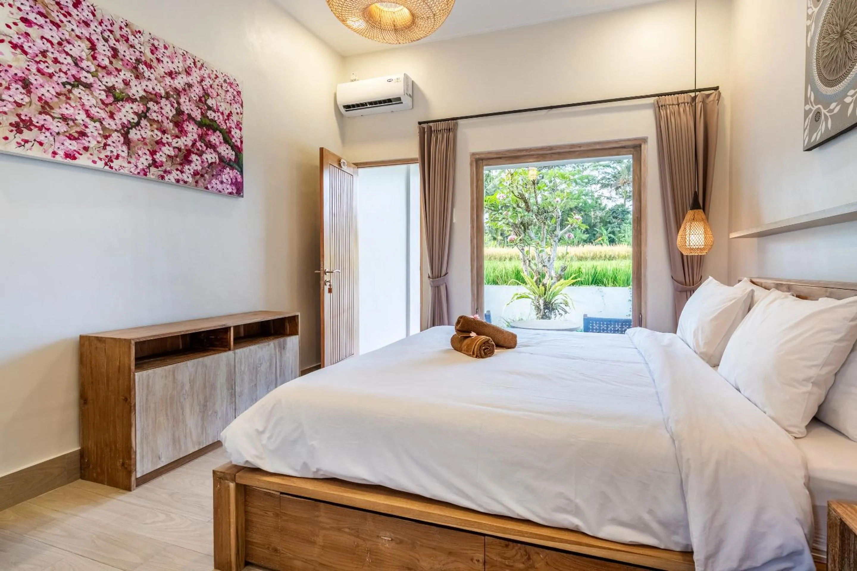 Bed in Aura Apartments Ubud