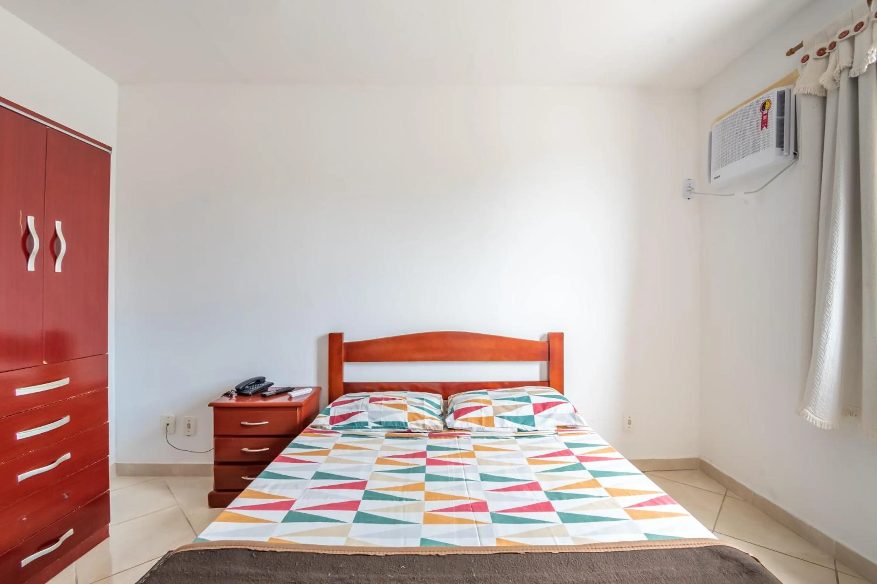 Bedroom, Bed in OYO Residencial Muriqui Apart Hotel, Mangaratiba