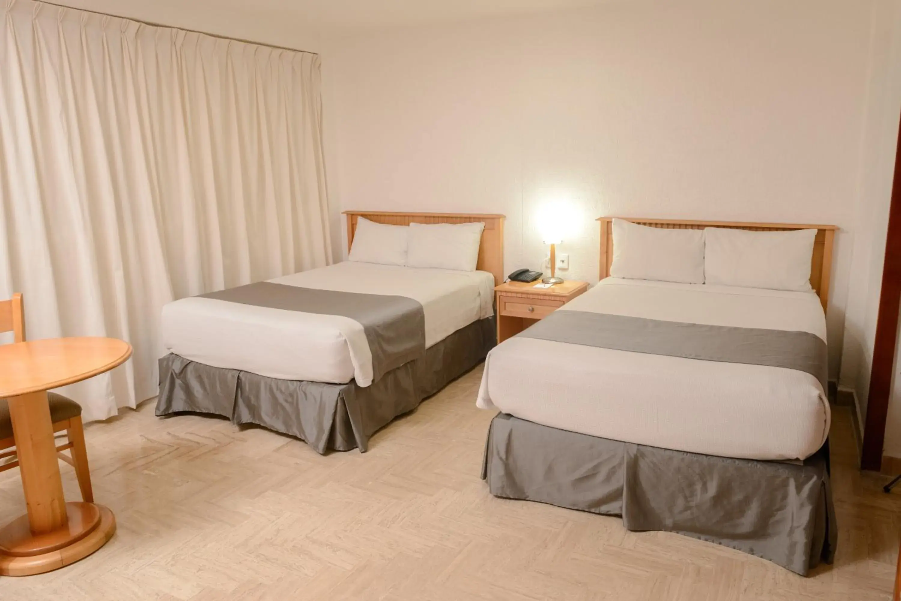 Bed in HOTEL DON MIGUEl Bed in HOTEL DON MIGUEl