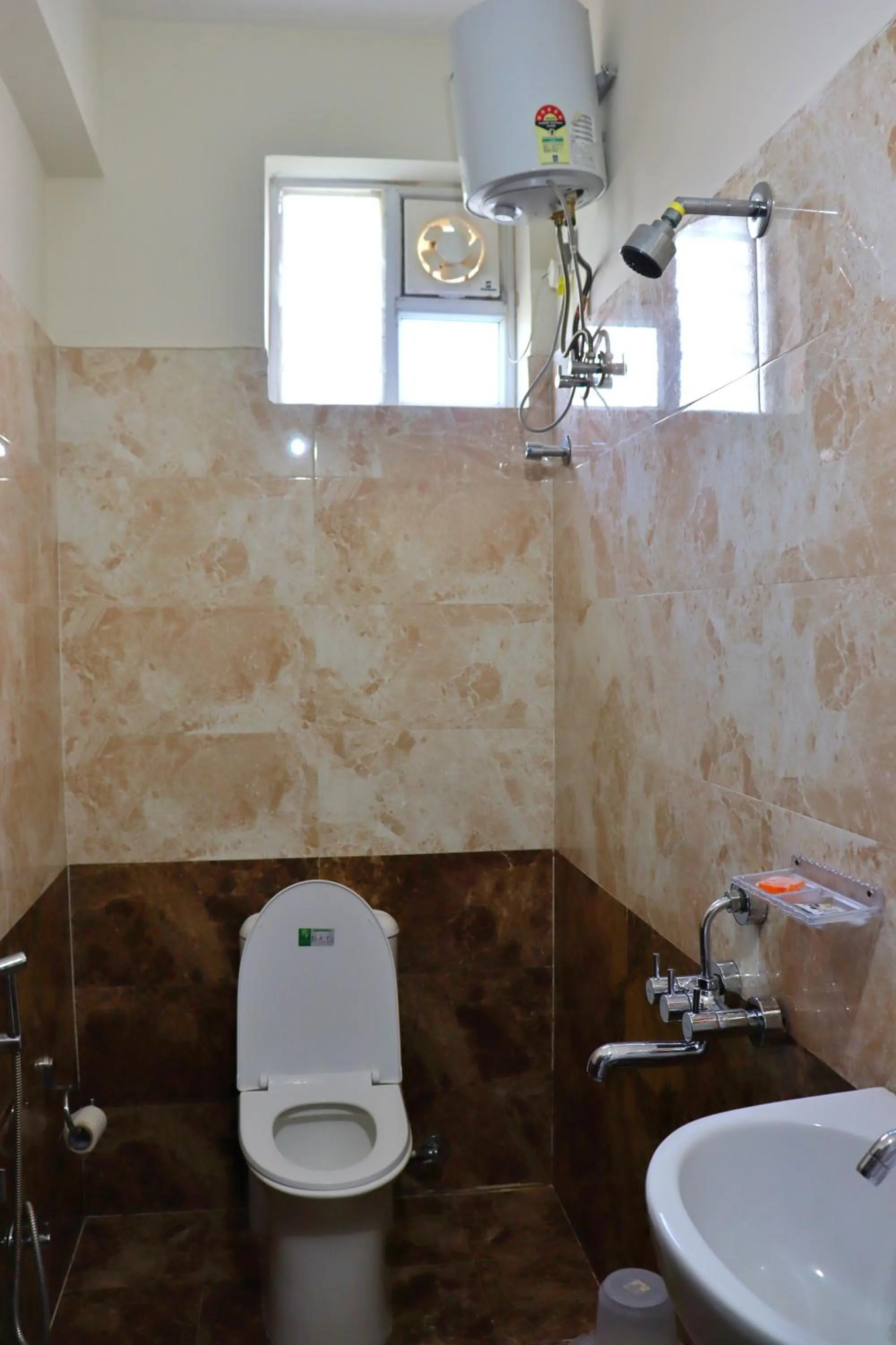 Shower in FabHotel Nirmalvilla Corporate