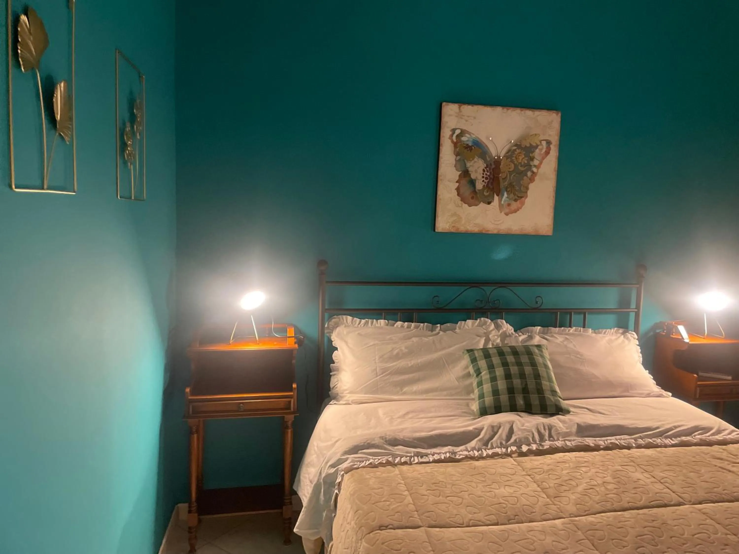 Bed in Pompei Duplex Apartment Deluxe