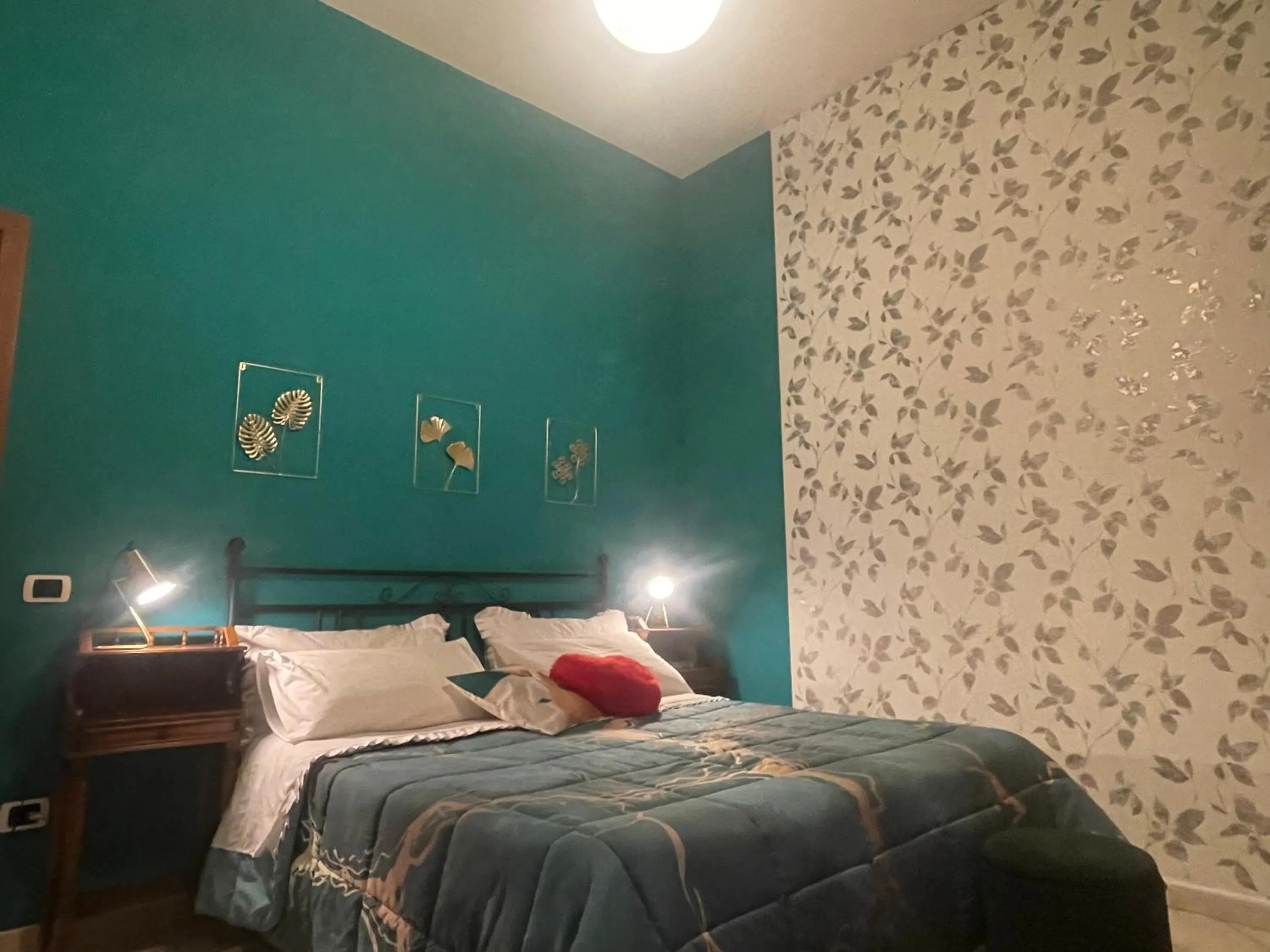 Bed in Pompei Duplex Apartment Deluxe