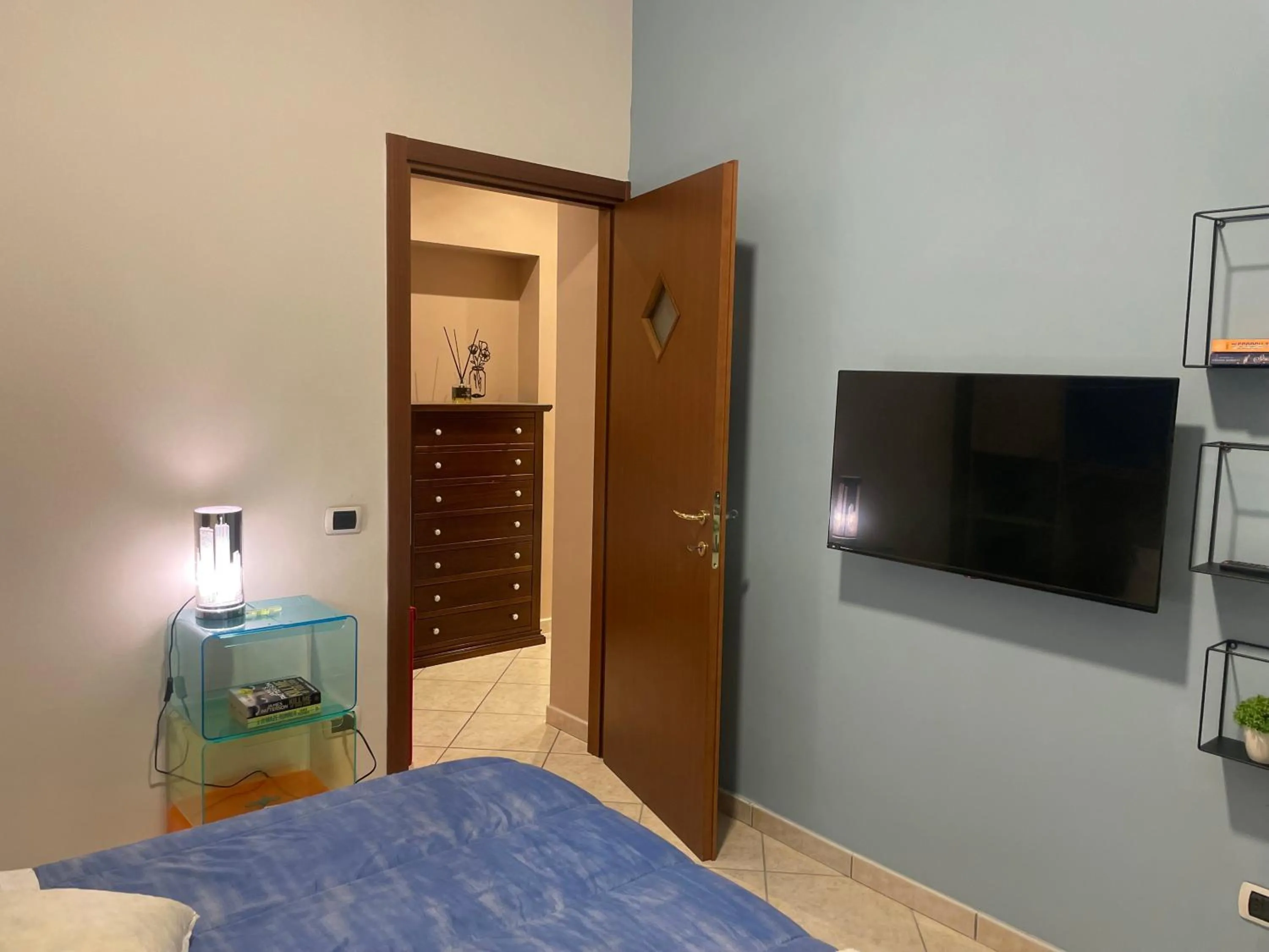 Bed in Pompei Duplex Apartment Deluxe