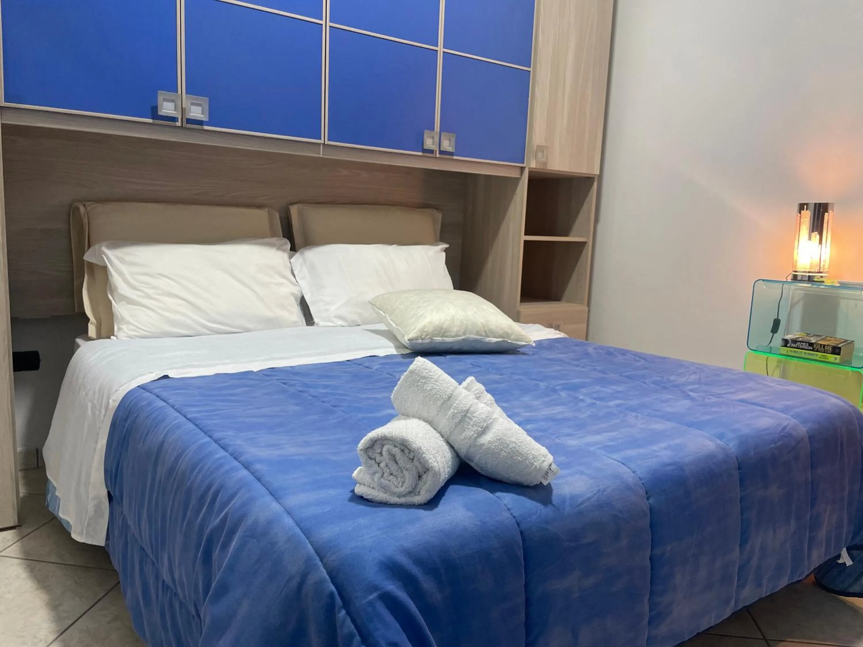 Bed in Pompei Duplex Apartment Deluxe