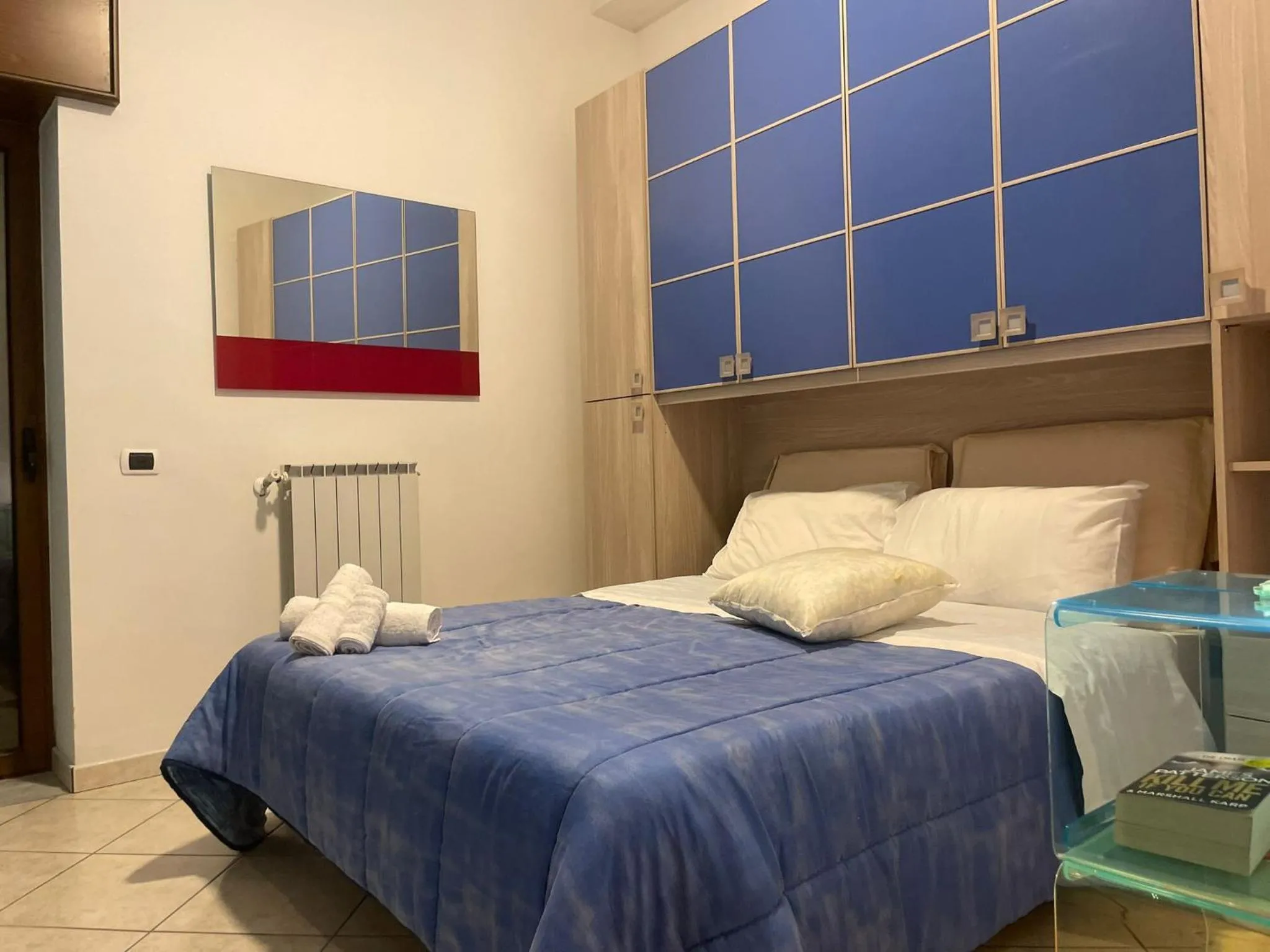 Bed in Pompei Duplex Apartment Deluxe