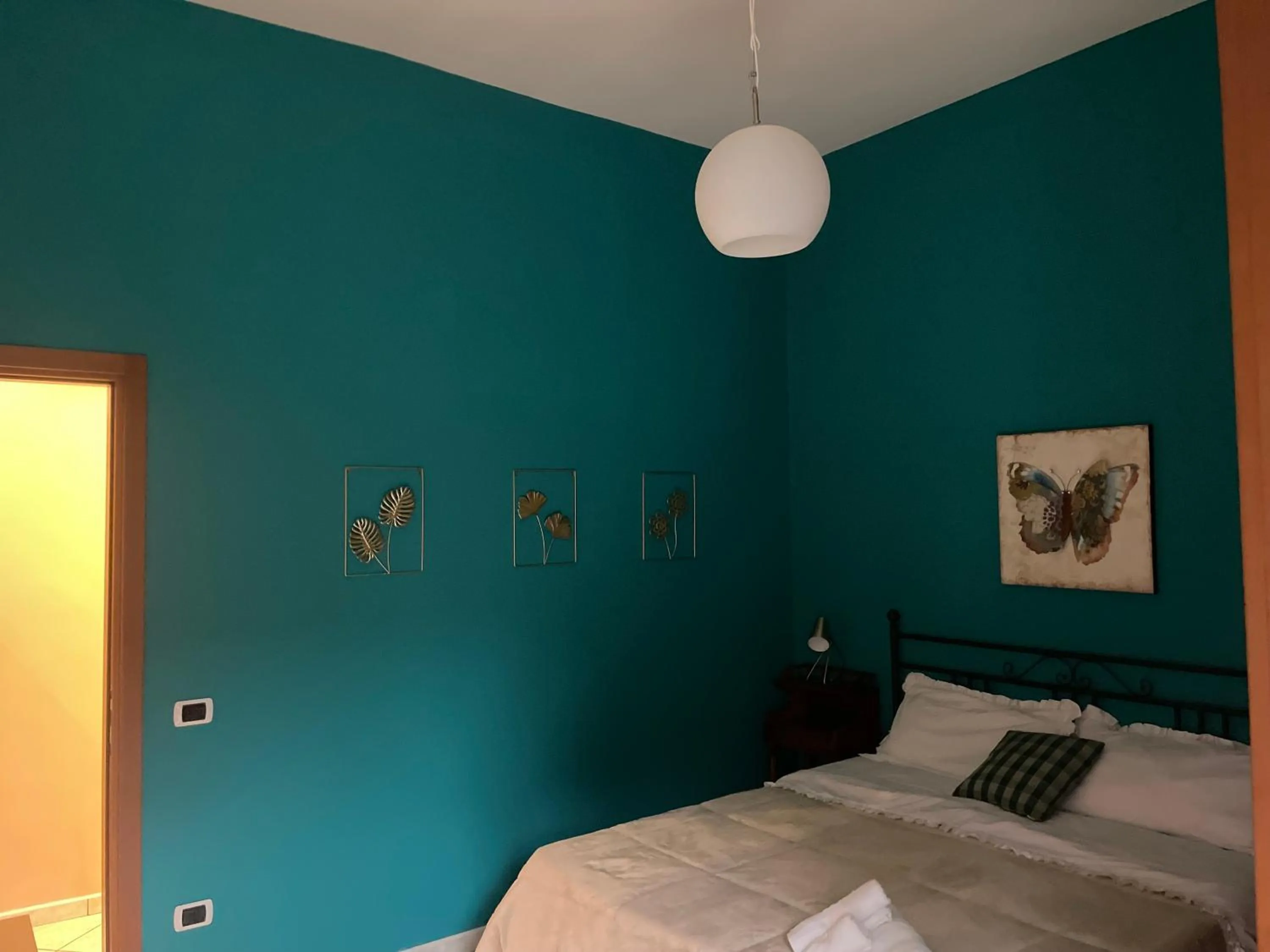 Bed in Pompei Duplex Apartment Deluxe