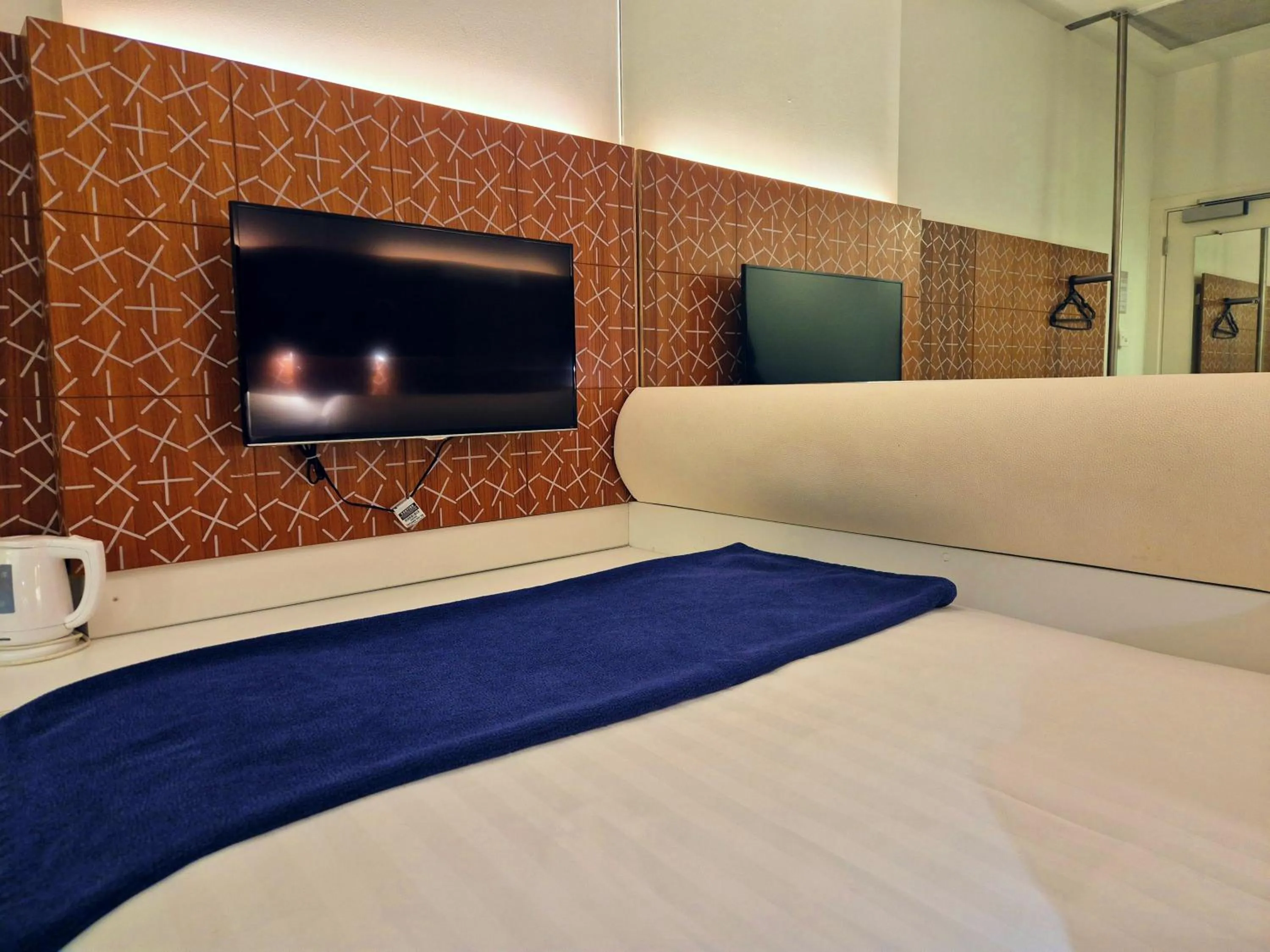 Bed in BreakFree on Cashel, an Accor Hotel