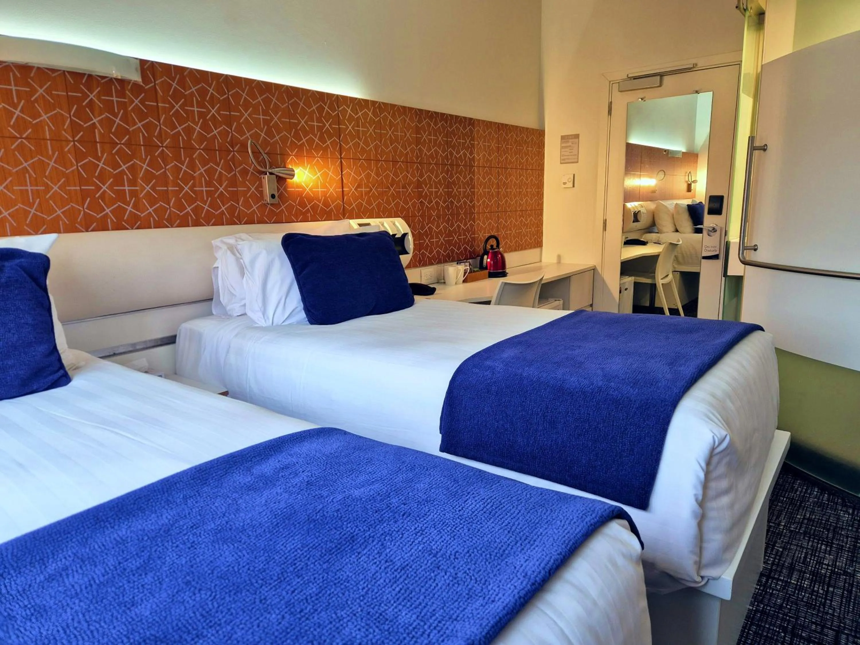 Bed in BreakFree on Cashel, an Accor Hotel