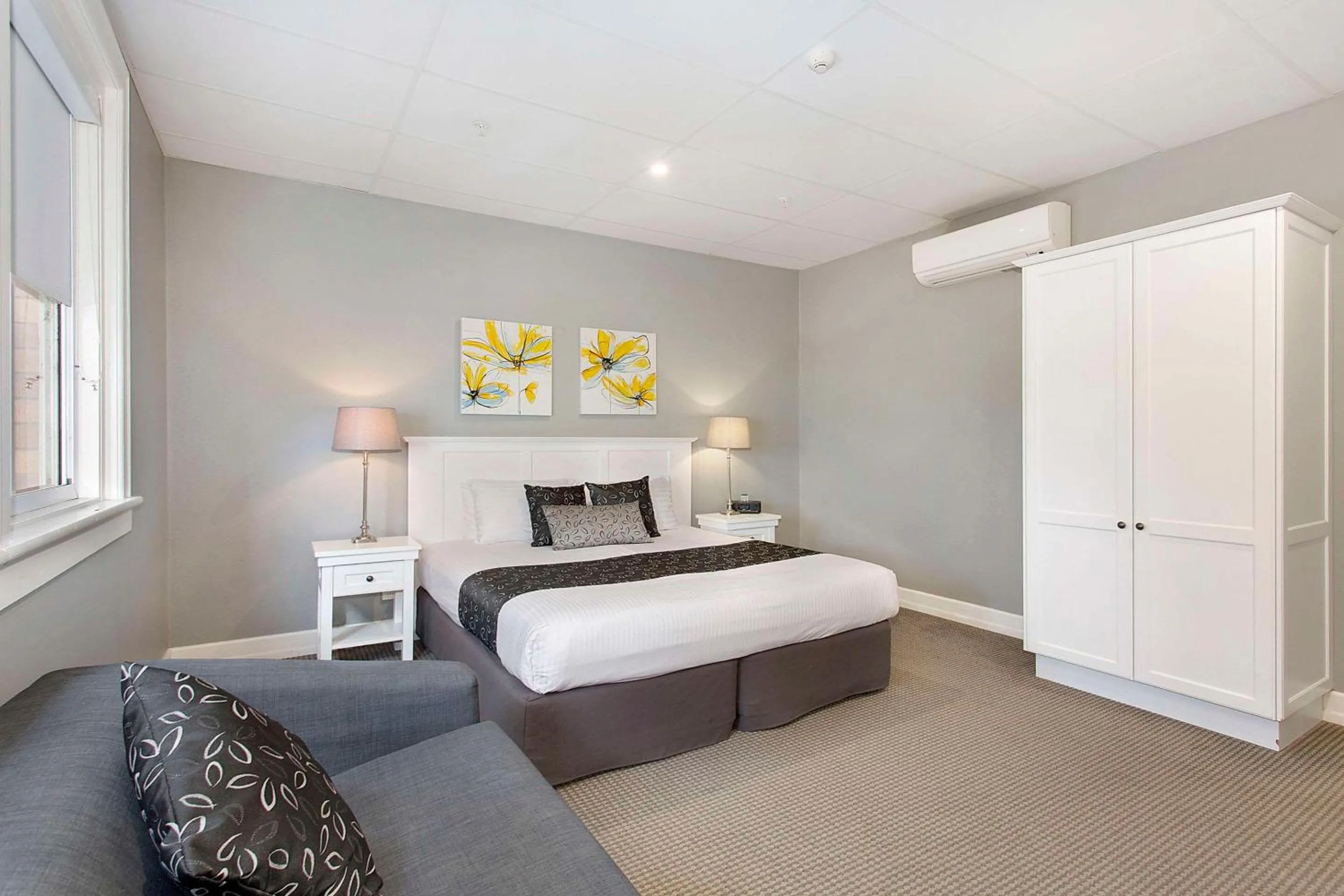 Bed in CH Boutique Hotel & Apartments, an Ascend Collection Hotel