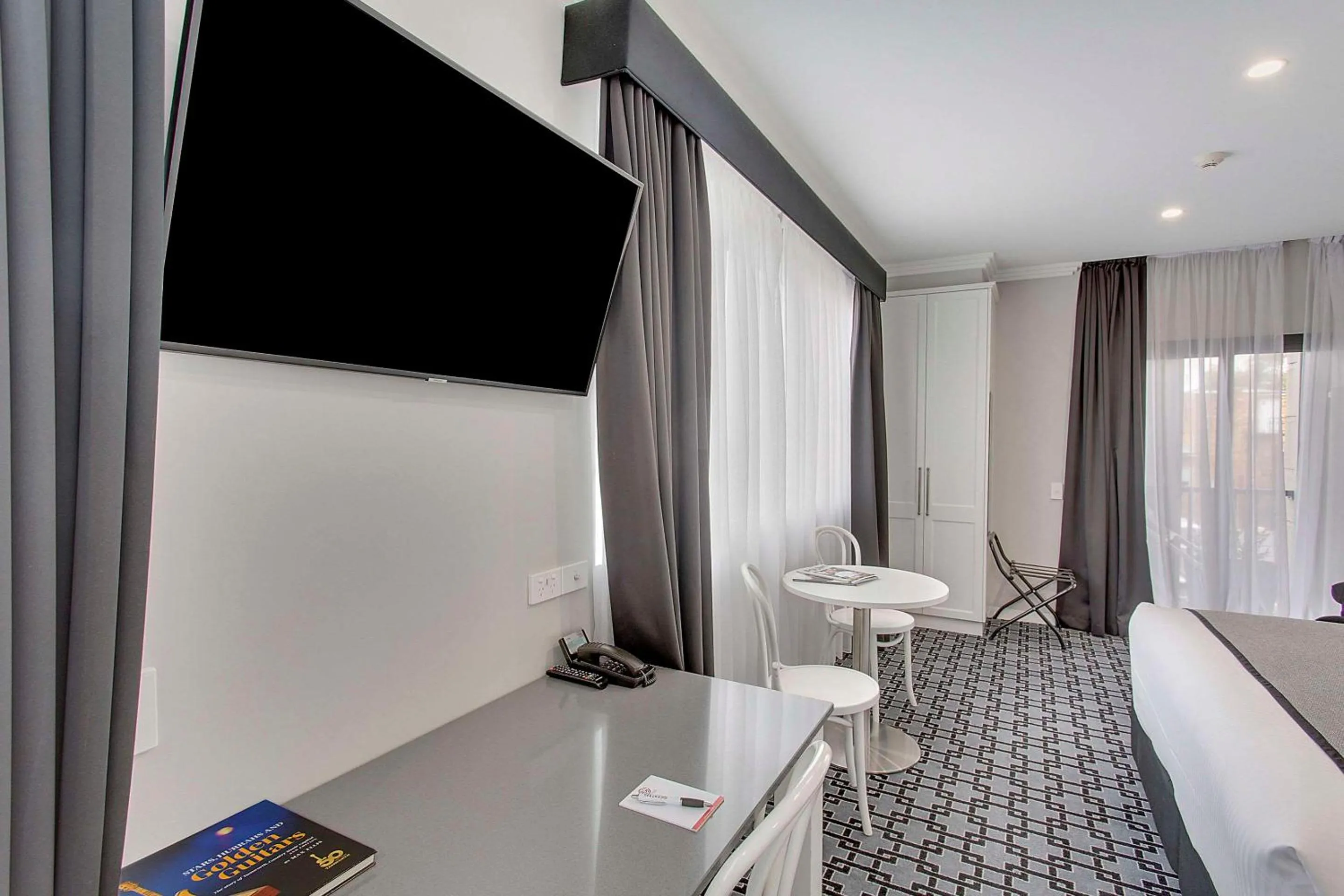 Bedroom in CH Boutique Hotel & Apartments, an Ascend Collection Hotel