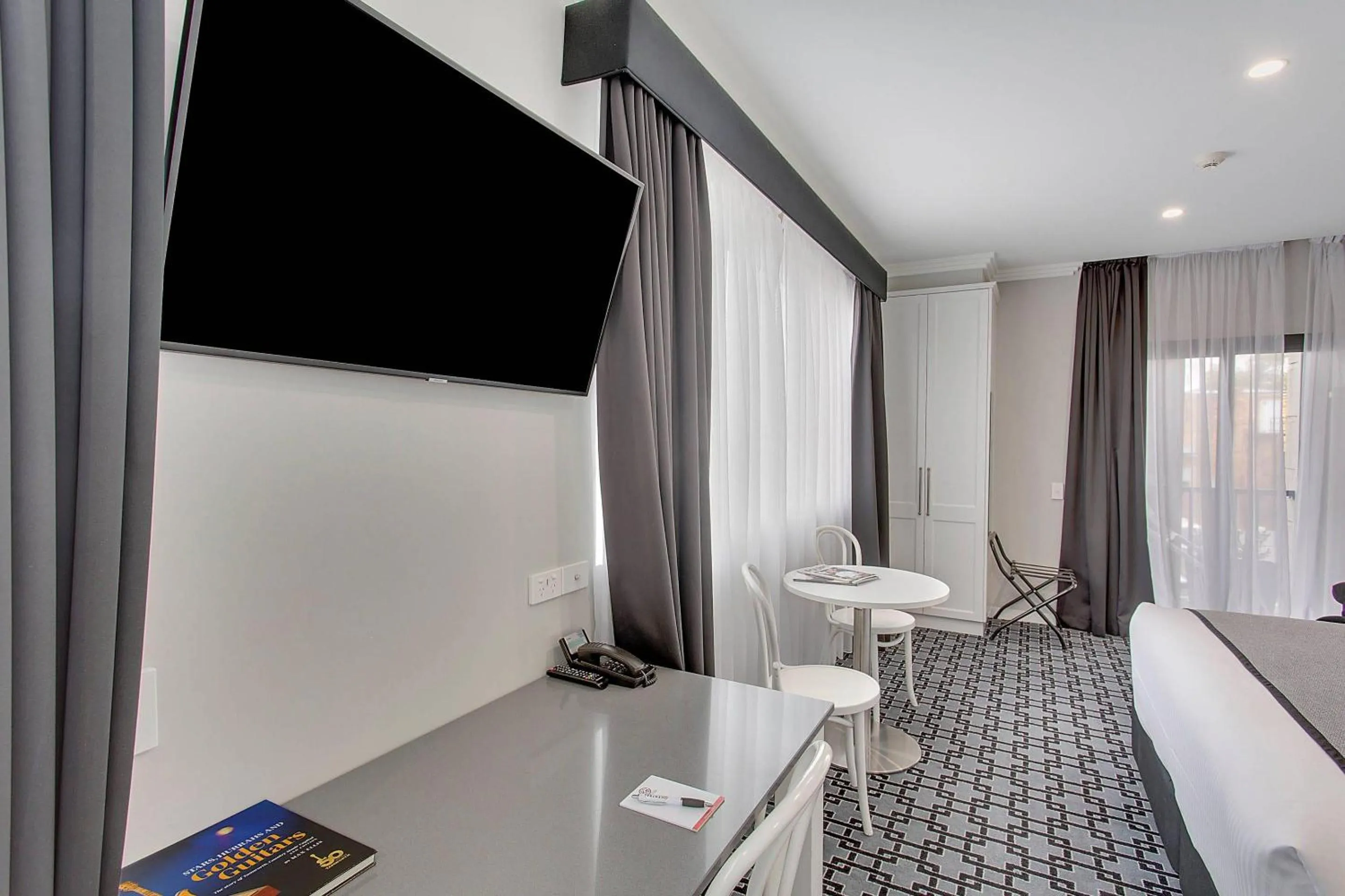 Bedroom in CH Boutique Hotel & Apartments, an Ascend Collection Hotel