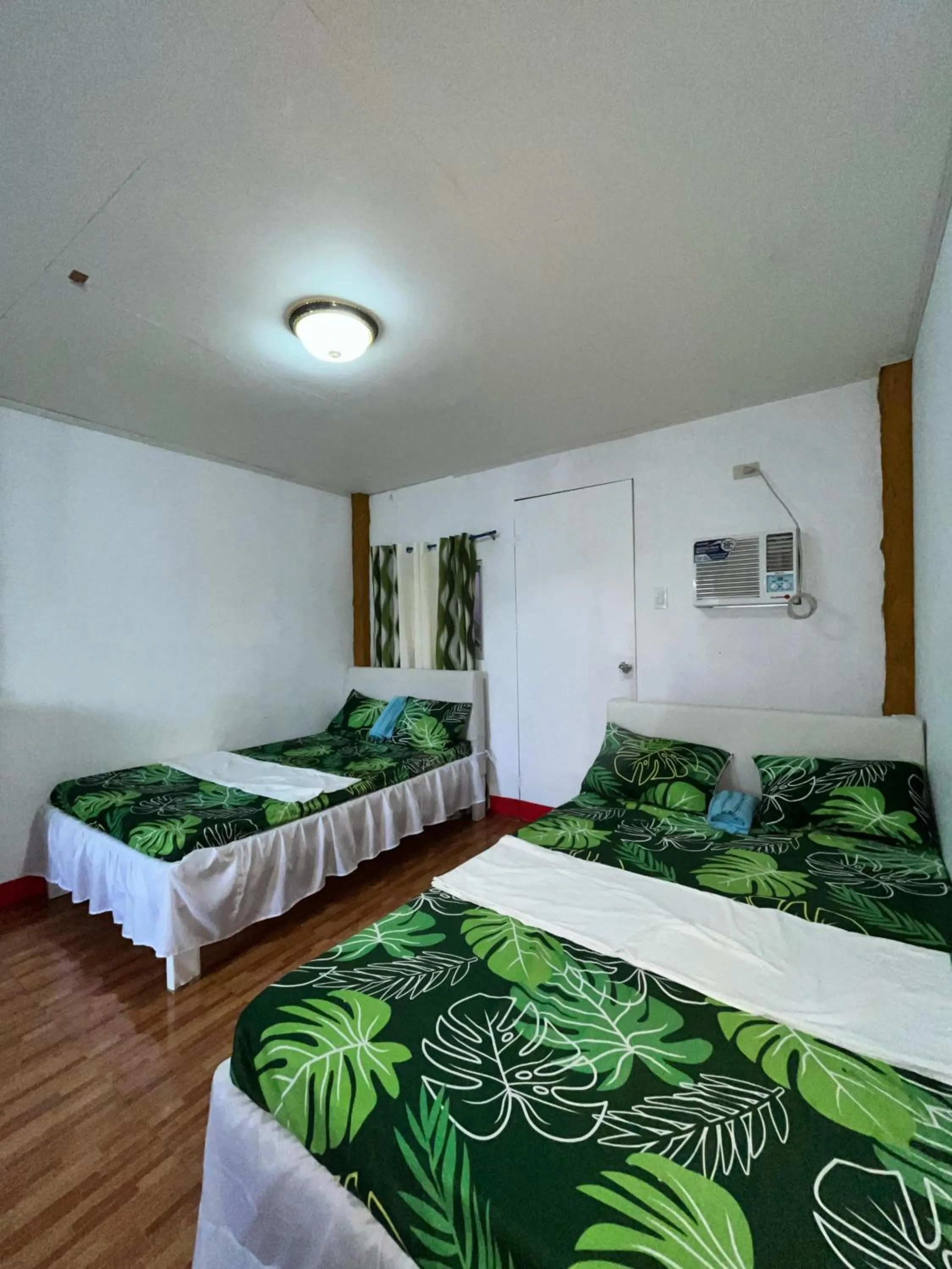 Bed in Isla Paraiso Resort-Hotel