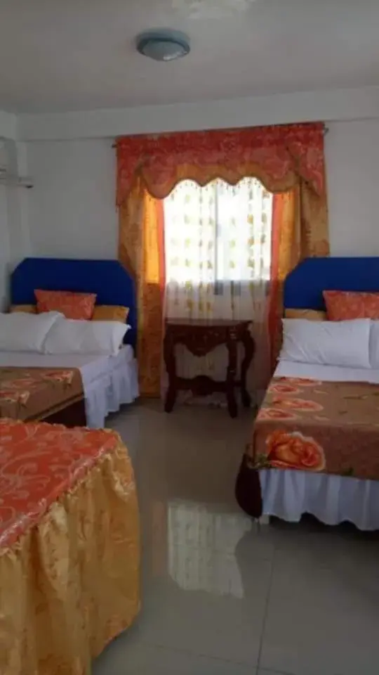 Bed in Isla Paraiso Resort-Hotel Bed in Isla Paraiso Resort-Hotel