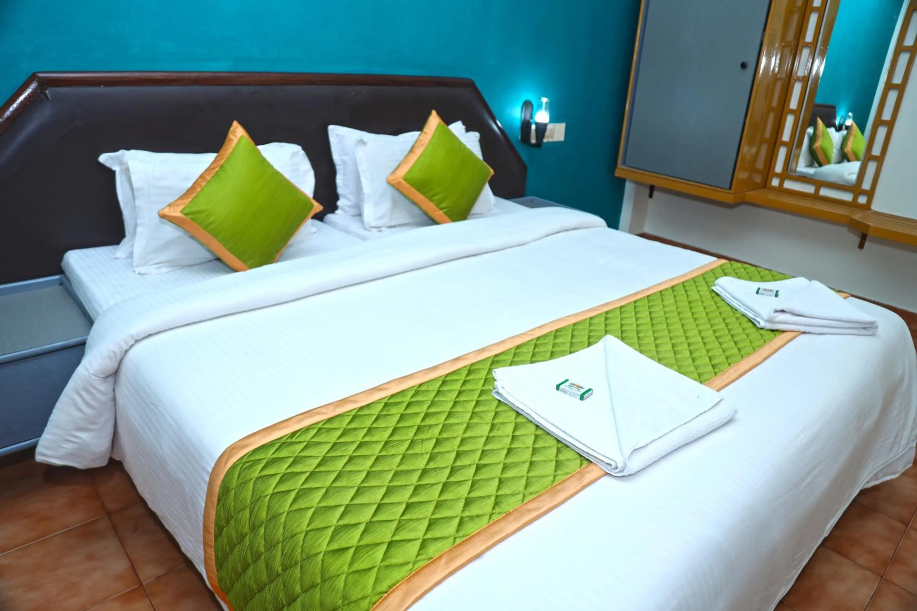 Bed in Grand Harmony Beach Resort