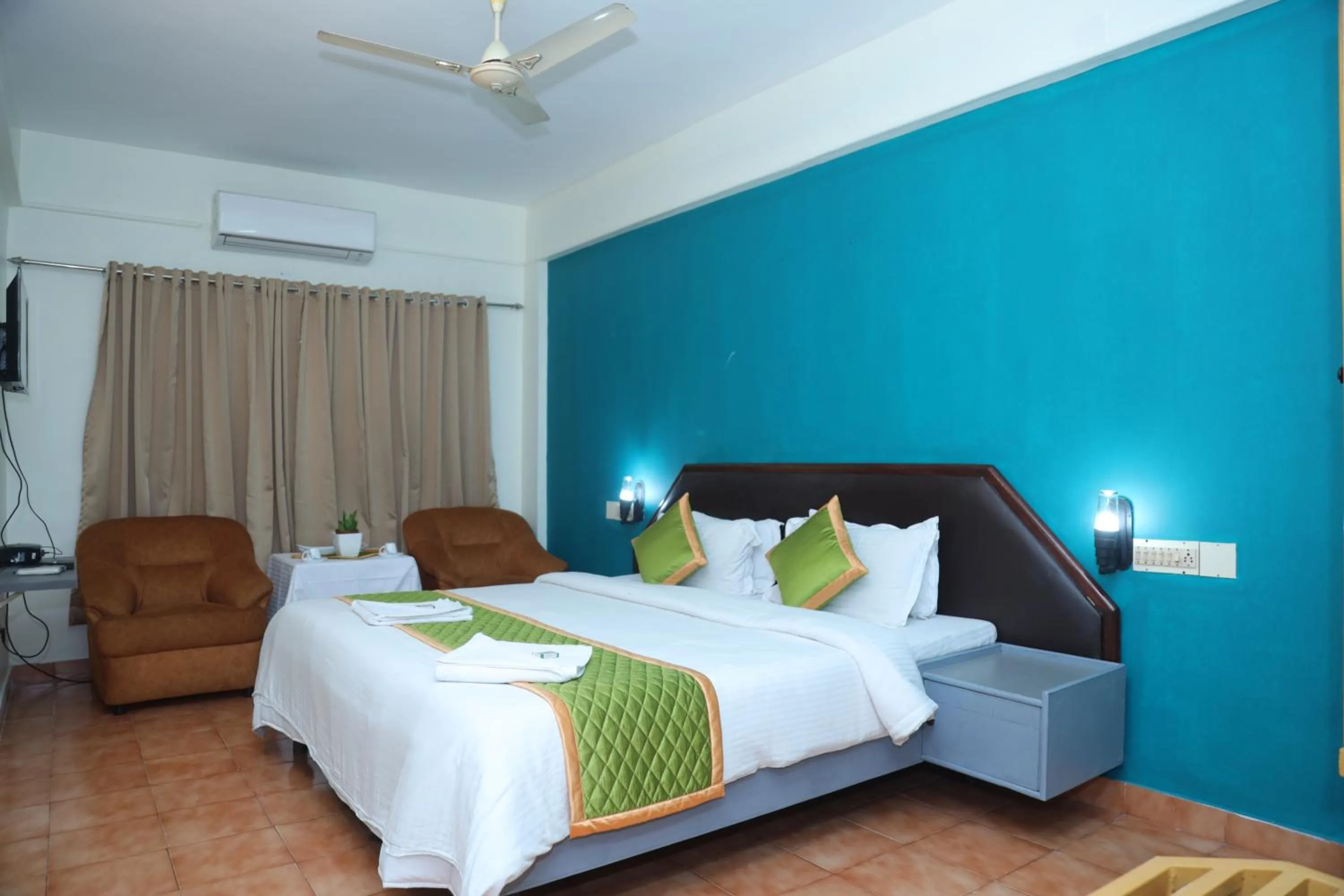 Living room, Bed in Grand Harmony Beach Resort