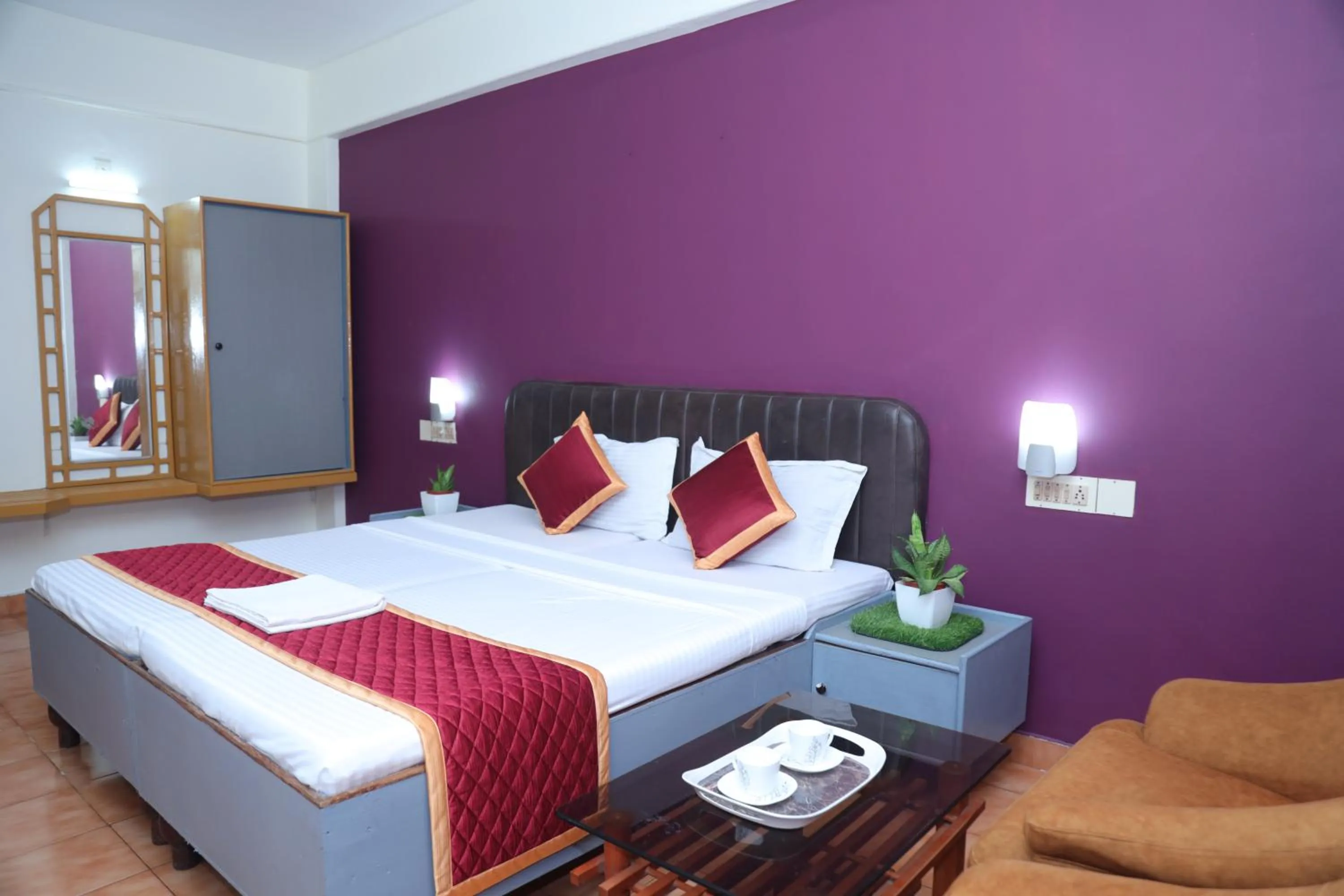 Bed in Grand Harmony Beach Resort