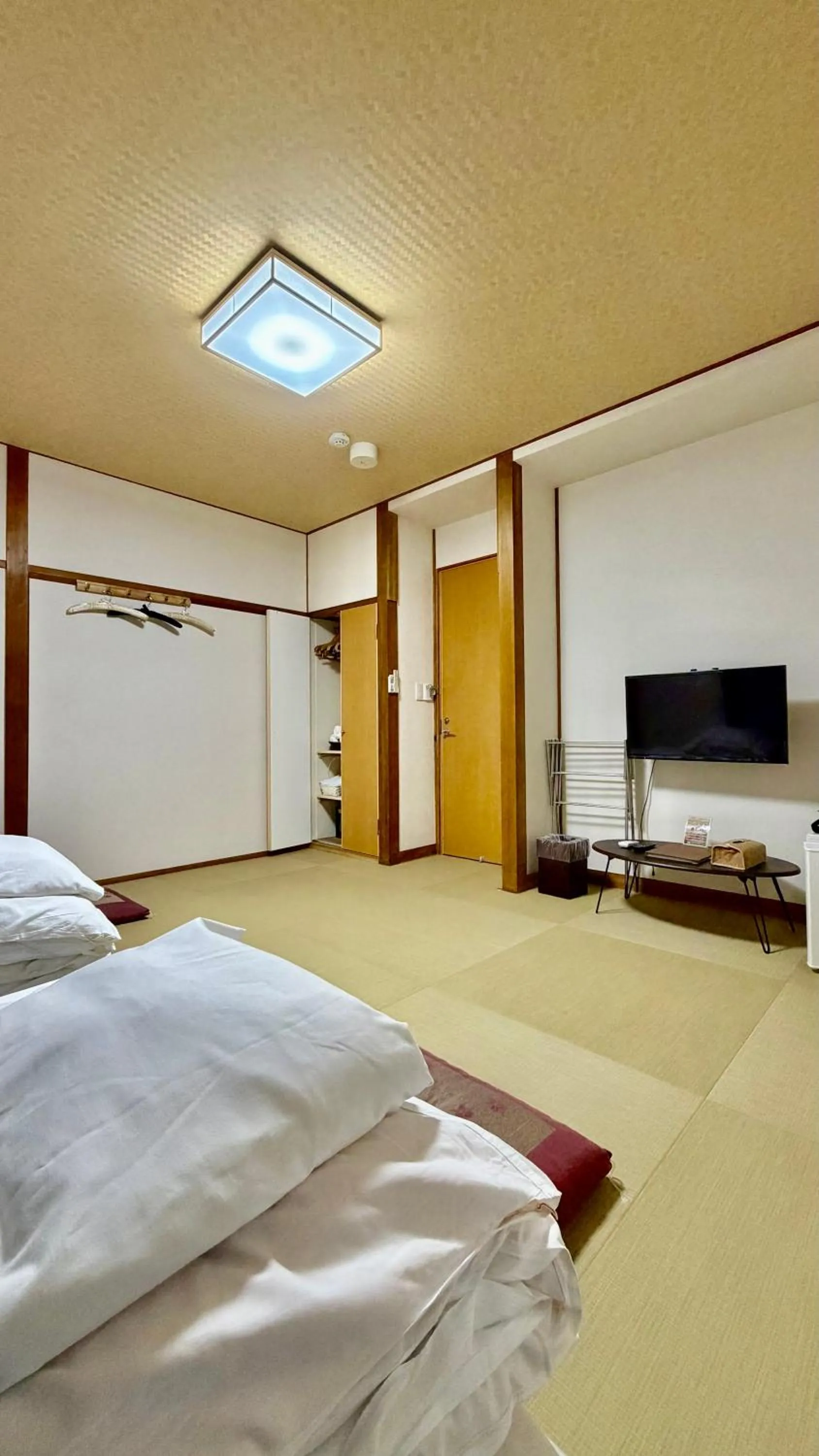 Bed in Tabist International Hotel Kaike