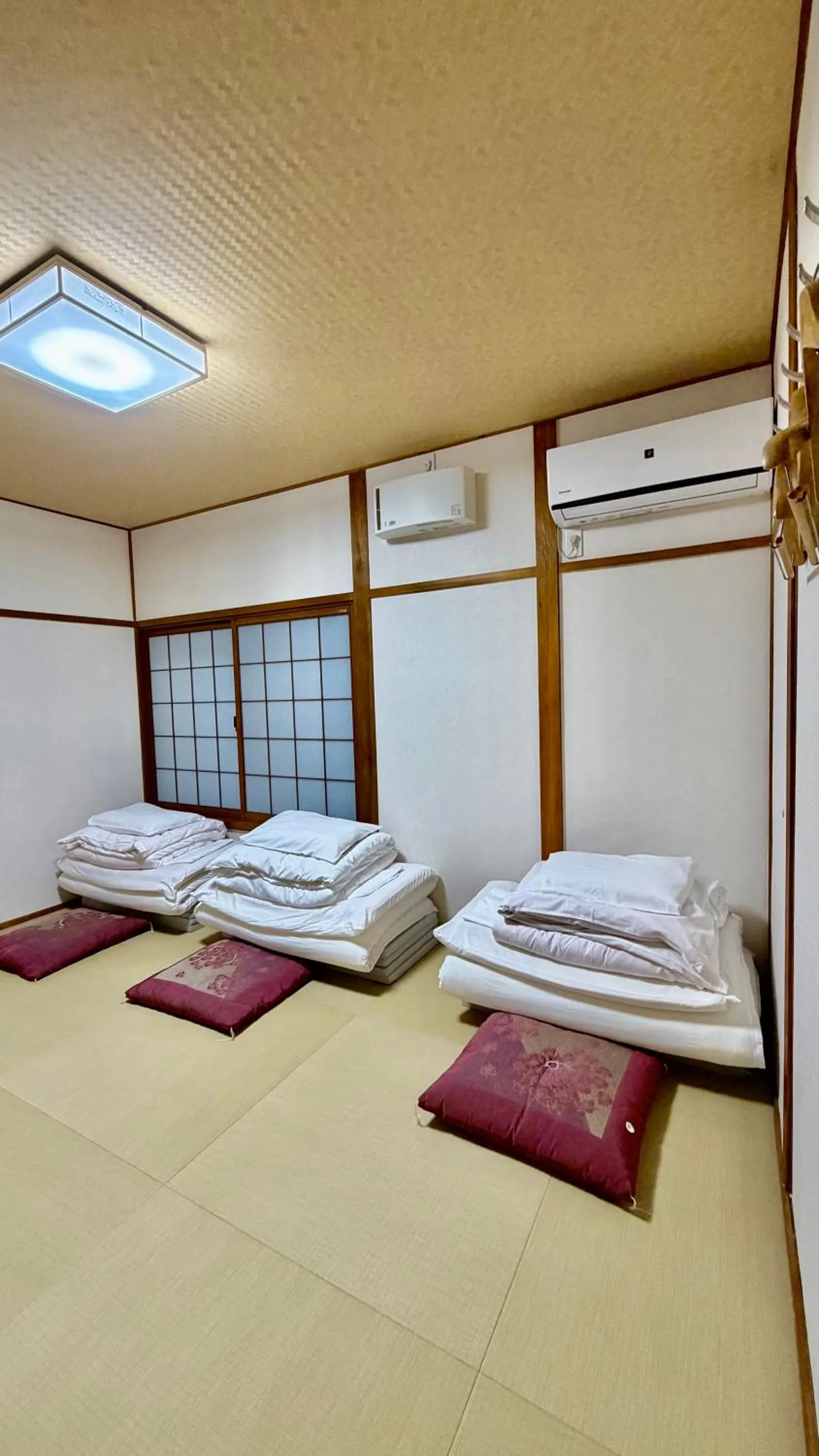 Bed in Tabist International Hotel Kaike